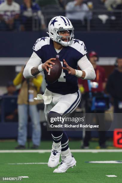 Dak Prescott of the Dallas Cowboys scrambles during the first half in the game against the New York Giants at AT&T Stadium on November 24, 2022 in...