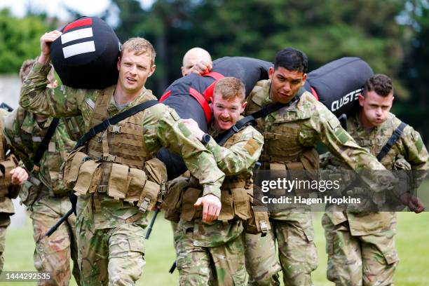 Soldiers carry 160kg bags during Exercise Torokiki at Linton Military Camp on November 25, 2022 in Palmerston North, New Zealand. Exercise Torokiri...