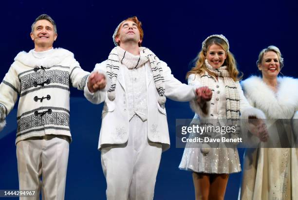 Tom Chambers, Simon Lipkin, Georgina Castle and Rebecca Lock bow at the curtain call during the press night performance of "Elf The Musical" at The...