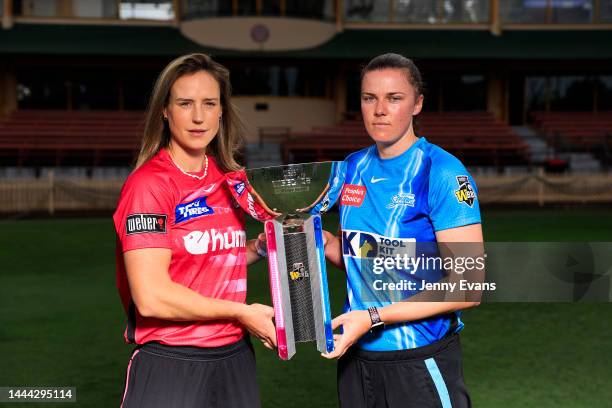 Sixers captain Ellyse Perry and Strikers captain Tahlia McGrath pose for a photo with the trophy ahead of the Women's Big Bash League Grand Final...