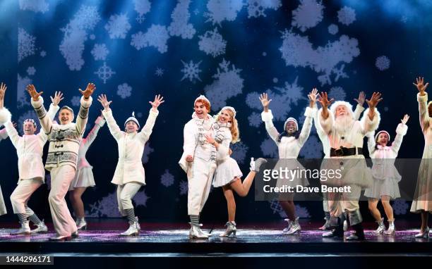Simon Lipkin and Georgina Castle with cast bow at the curtain call during the press night performance of "Elf The Musical" at The Dominion Theatre on...