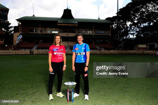 Sixers captain Ellyse Perry and Strikers captain Tahlia McGrath pose for a photo with the trophy ahead of the Women's Big Bash League Grand Final...