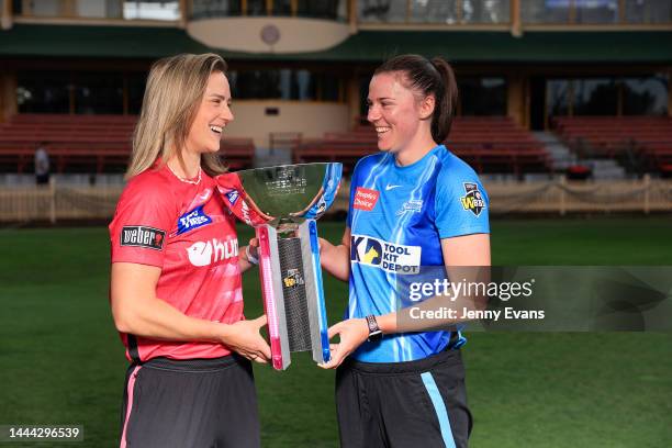 Sixers captain Ellyse Perry and Strikers captain Tahlia McGrath pose for a photo with the trophy ahead of the Women's Big Bash League Grand Final...