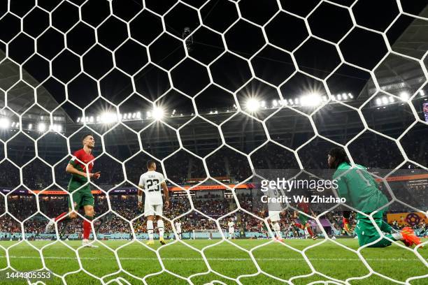 Cristiano Ronaldo of Portugal celebrates after team mate Rafael Leao scored their team's third goal during the FIFA World Cup Qatar 2022 Group H...