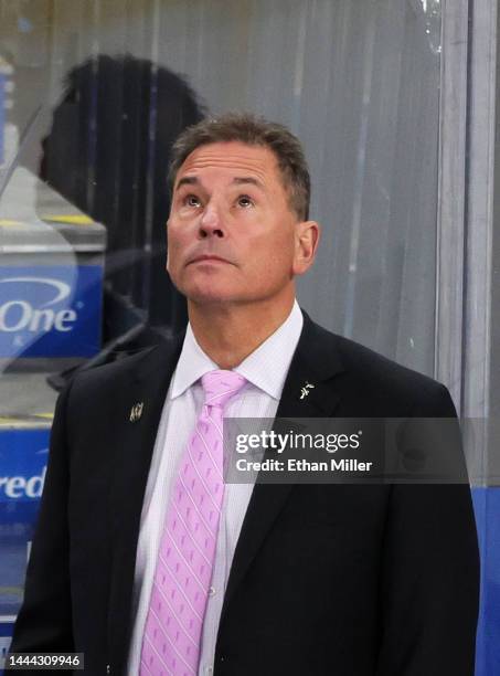 Head coach Bruce Cassidy of the Vegas Golden Knights looks at the scoreboard as he handles bench duties in the second period of a game against the...