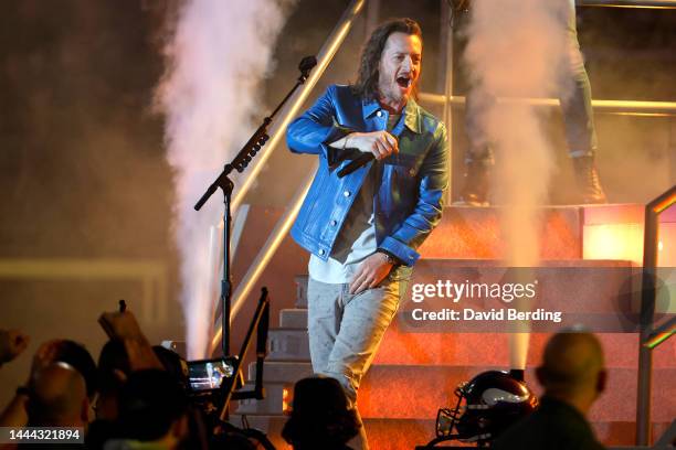 Tyler Hubbard performs during halftime of a game between the New England Patriots and Minnesota Vikings at U.S. Bank Stadium on November 24, 2022 in...