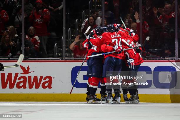 Marcus Johansson of the Washington Capitals celebrates with teammates after scoring a goal against the Philadelphia Flyers during the first period of...