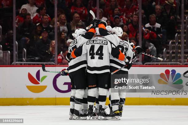 Patrick Brown of the Philadelphia Flyers celebrates with teammates after scoring a goal against the Washington Capitals during the second period of...
