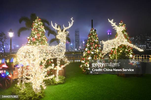 Illuminated Christmas lights in the shape of deer are seen at the West Kowloon Art Park on November 24, 2022 in Hong Kong, China.