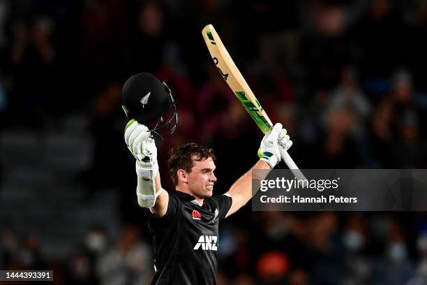 Tom Latham of the Black Caps celebrates after scoring a century during game one of the One Day International series between New Zealand and India at...