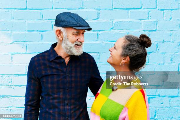 woman and man looking at each other affectionately, portrait - fun lovers unite stock pictures, royalty-free photos & images