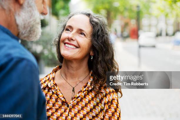 woman and man spending time together - couple close up street stock pictures, royalty-free photos & images