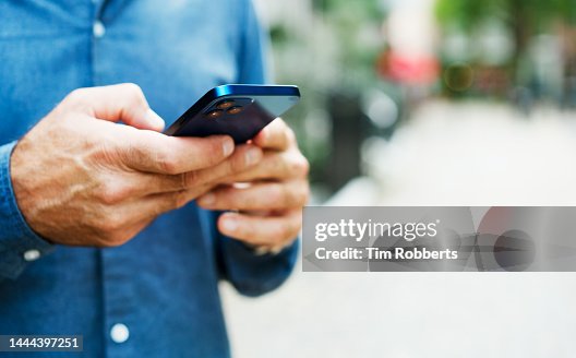 Close up of man using smart phone Close up of man using smart phone