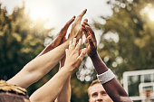 Basketball, winner and hands, team high five for outdoor game. Success, diversity and victory goal for sports for men. Teamwork, diversity and support, friends on basketball court together with coach