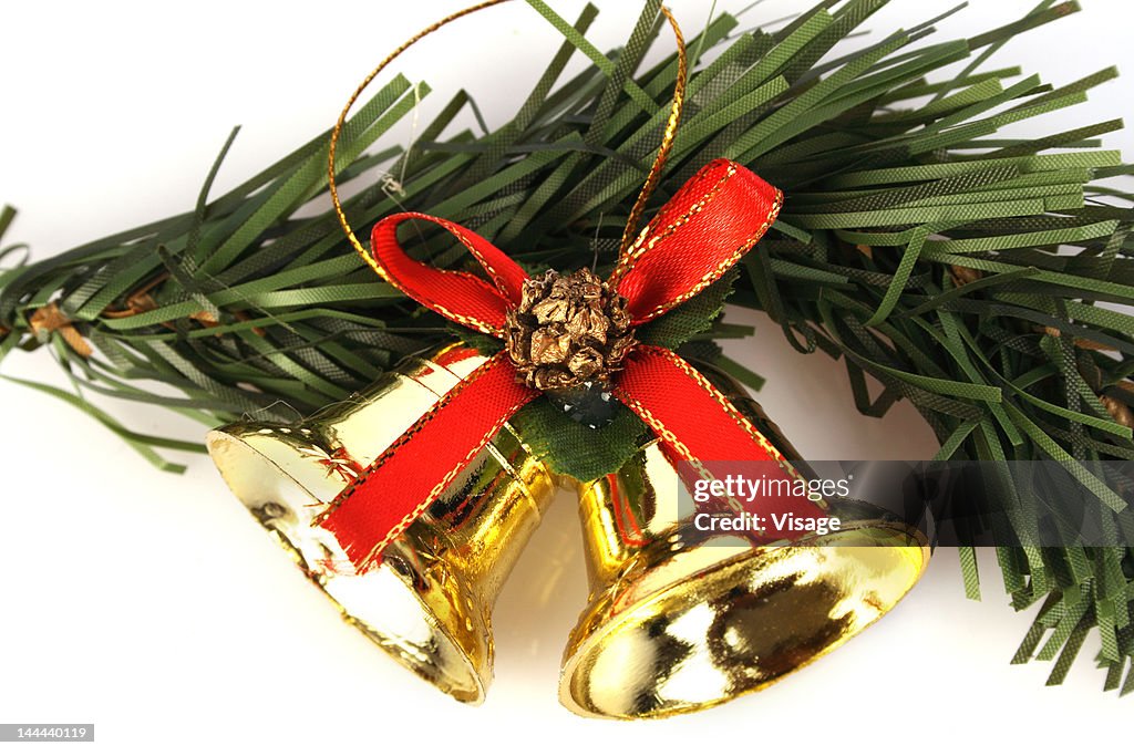Christmas bells and wreath, close-up