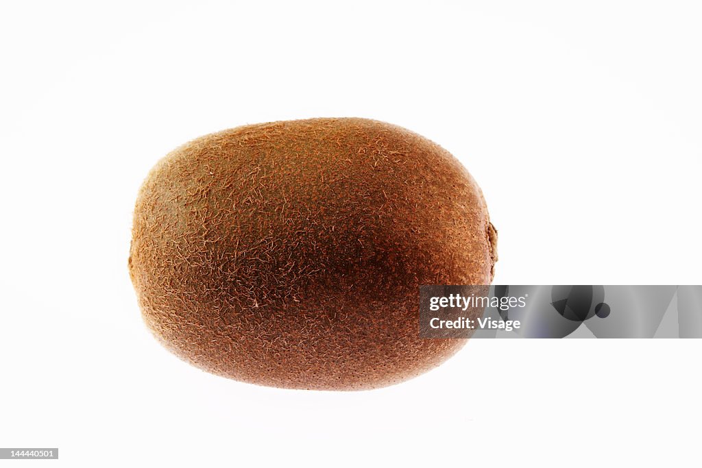 A studio shot of a kiwifruit