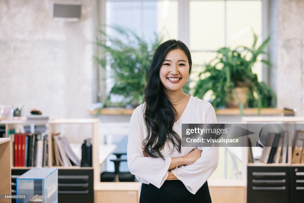 Confident Japanese businesswoman at the office