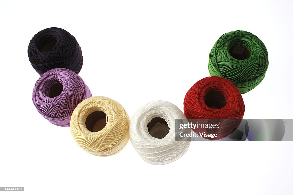 Top angle view of spools of Coloured thread