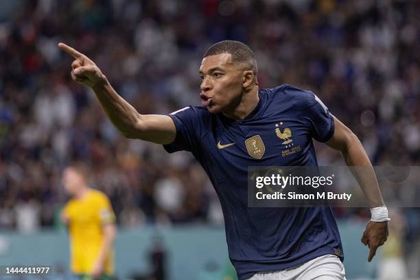 November, 22: Kylian Mbappe of France celebrates scoring a goal to make it 4-1 during the FIFA World Cup Qatar 2022 Group D match between France and...