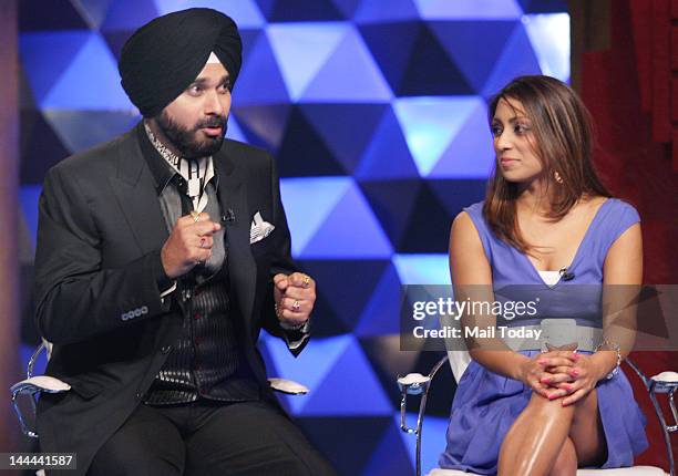 Navjot Singh Sidhu and Isa Guha on the sets of IPL Extra Innings, shot at RK Studios in Mumbai.