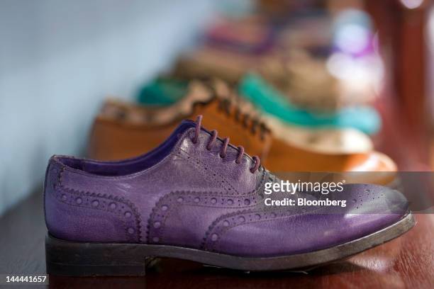 Paul Smith Ltd. Shoes are displayed in one of the company's stores in Hong Kong, China, on Monday, May 14, 2012. Paul Smith, the British fashion...