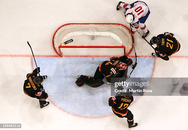 Lars Spets of Norway fails to score over Dennis Endras , goaltendet of Germany during the IIHF World Championship group S match between Germany and...