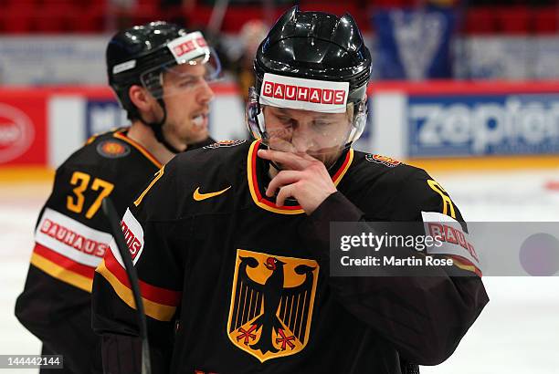 Sebastian Furchner of Germany looks dejected during the IIHF World Championship group S match between Germany and Norway at Ericsson Globe on May 13,...