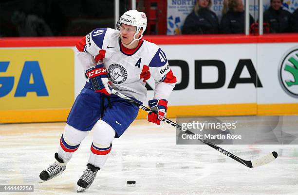 Patrick Thoresen of Norway controls the puck against Germany during the IIHF World Championship group S match between Germany and Norway at Ericsson...