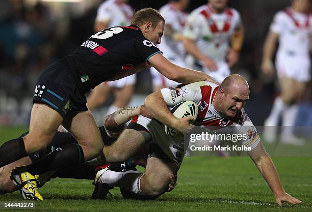 Michael Weyman of the Dragons is tackled during the round 10 NRL match between the Penrith Panthers and the St George Illawarra Dragons at Centrebet...