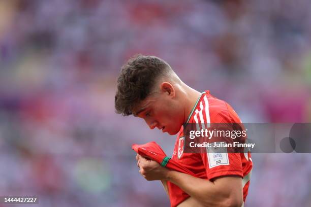 Daniel James of Wales reacts during the FIFA World Cup Qatar 2022 Group B match between Wales and IR Iran at Ahmad Bin Ali Stadium on November 25,...