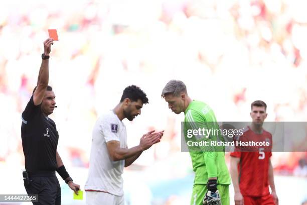 Wayne Hennessey of Wales is shown a red card by referee Mario Alberto Escobar Toca during the FIFA World Cup Qatar 2022 Group B match between Wales...