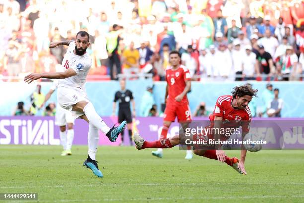 Roozbeh Cheshmi of IR Iran scores their team's first goal during the FIFA World Cup Qatar 2022 Group B match between Wales and IR Iran at Ahmad Bin...
