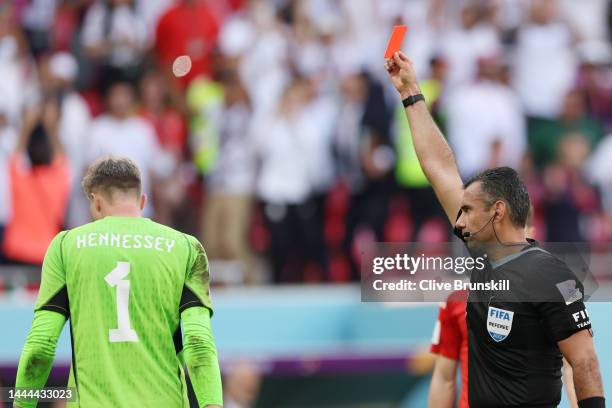 Wayne Hennessey of Wales is shown a red card by referee Mario Alberto Escobar Toca after the Video Assistant Referee review during the FIFA World Cup...