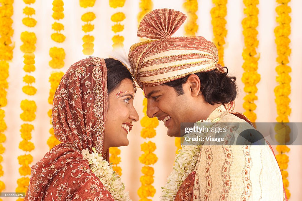 A couple looking at each other at their wedding