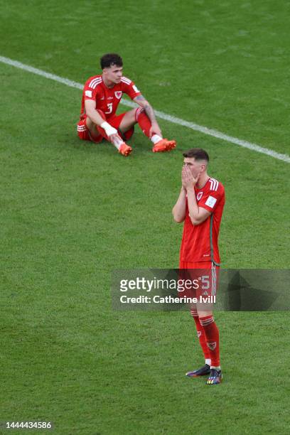 Neco Williams and Chris Mepham of Wales react after the 0-2 loss during the FIFA World Cup Qatar 2022 Group B match between Wales and IR Iran at...
