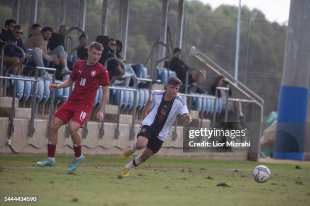 Sidney Raebiger of Germany in action with Roman Horak of Czech Republic during the U18 match at the Winter Tournament on November 25, 2022 in...