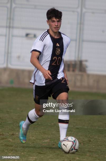 Mert Komur of Germany runs wuth the ball during a gamae against Czech Republic at the U18 match at the Winter Tournament on November 25, 2022 in...