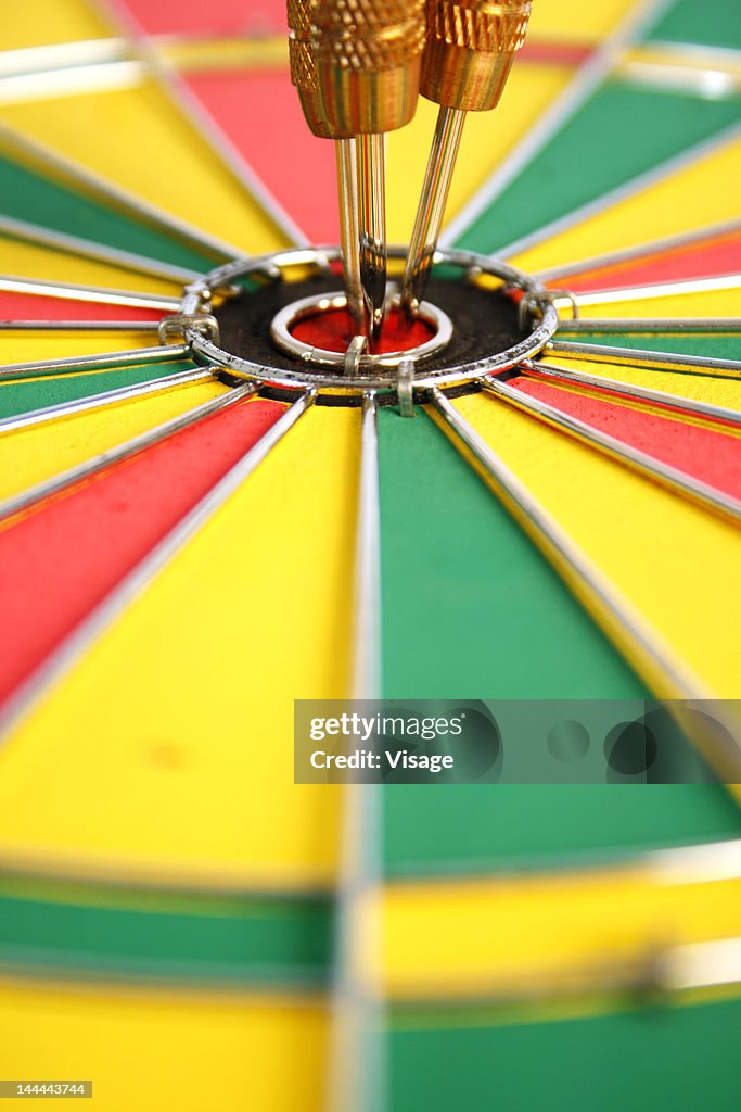 Darts in center of a dartboard