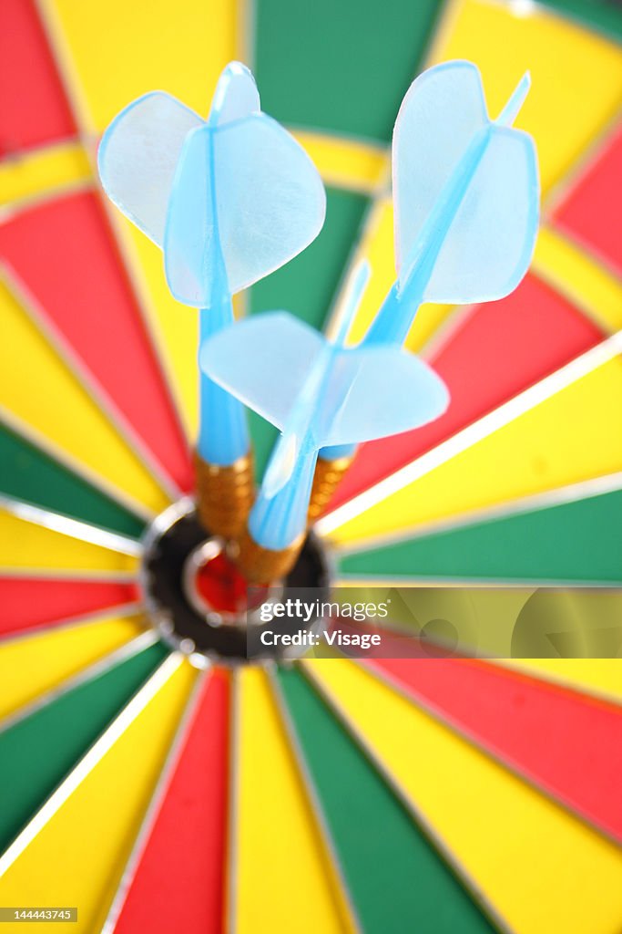 Darts in center of a dartboard