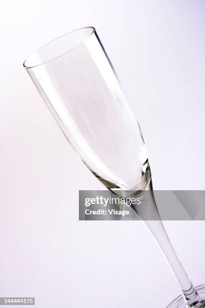 close-up of a champagne glass - empty glass stock pictures, royalty-free photos & images