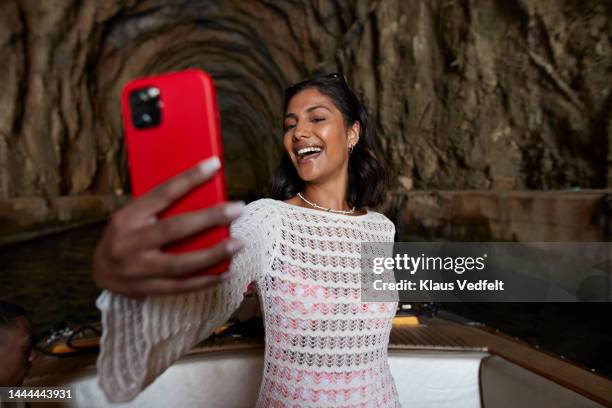 happy young woman taking selfie on mobile phone - generation z selfie stock pictures, royalty-free photos & images