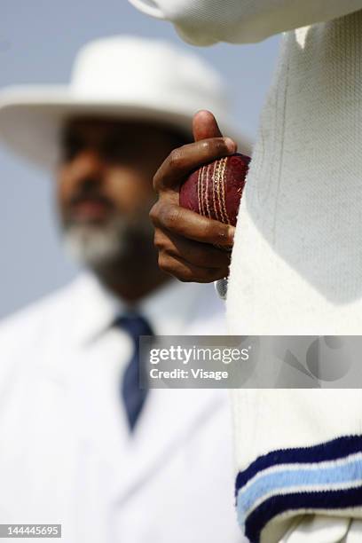 a spinner in action - cricket umpire stock pictures, royalty-free photos & images