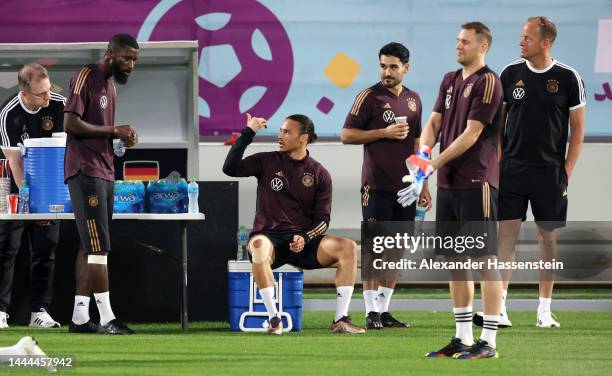 Antonio Ruediger, Leroy Sane, Ilkay Guendogan and Manuel Neuer of Germany interact during the Germany Training Session on November 25, 2022 in Al...