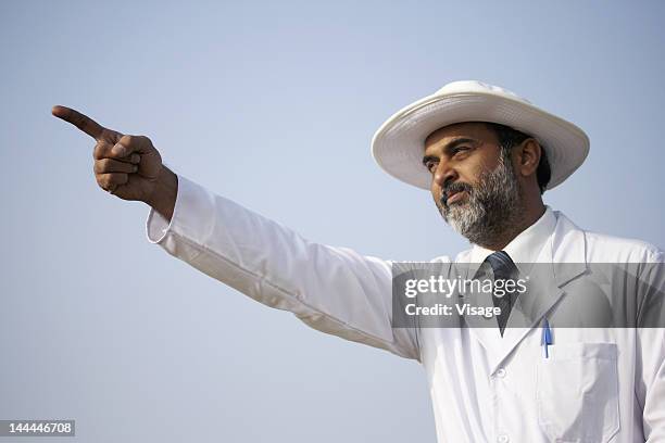 close up shot of an umpire - cricket umpire stock pictures, royalty-free photos & images