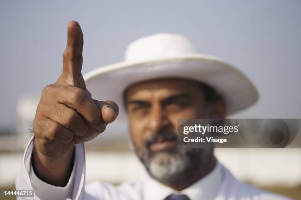 close up shot of an umpire - cricket umpire stock pictures, royalty-free photos & images