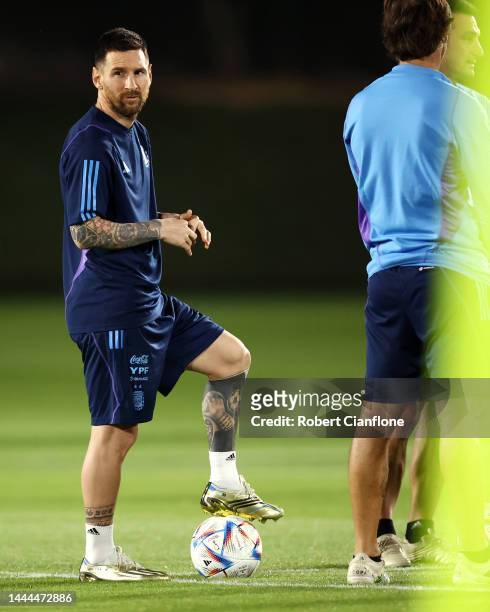 Lionel Messi of Argentina looks on during the Argentina MD-1 training session at Qatar University on November 25, 2022 in Doha, Qatar.
