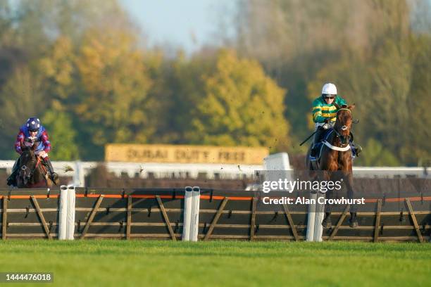 Jonjo O'Neill Jr riding Champ clear the last to win The Coral Long Distance Hurdle at Newbury Racecourse on November 25, 2022 in Newbury, England.