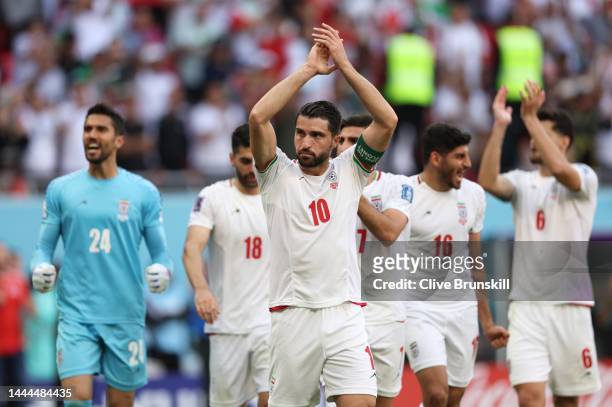 Karim Ansarifard of IR Iran applauds the fans after their 2-0 victory during the FIFA World Cup Qatar 2022 Group B match between Wales and IR Iran at...