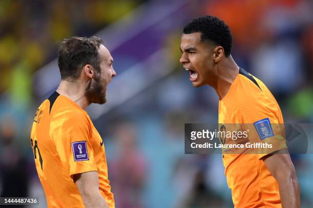 Cody Gakpo of Netherlands celebrates with Daley Blind after scoring their team's first goal during the FIFA World Cup Qatar 2022 Group A match...