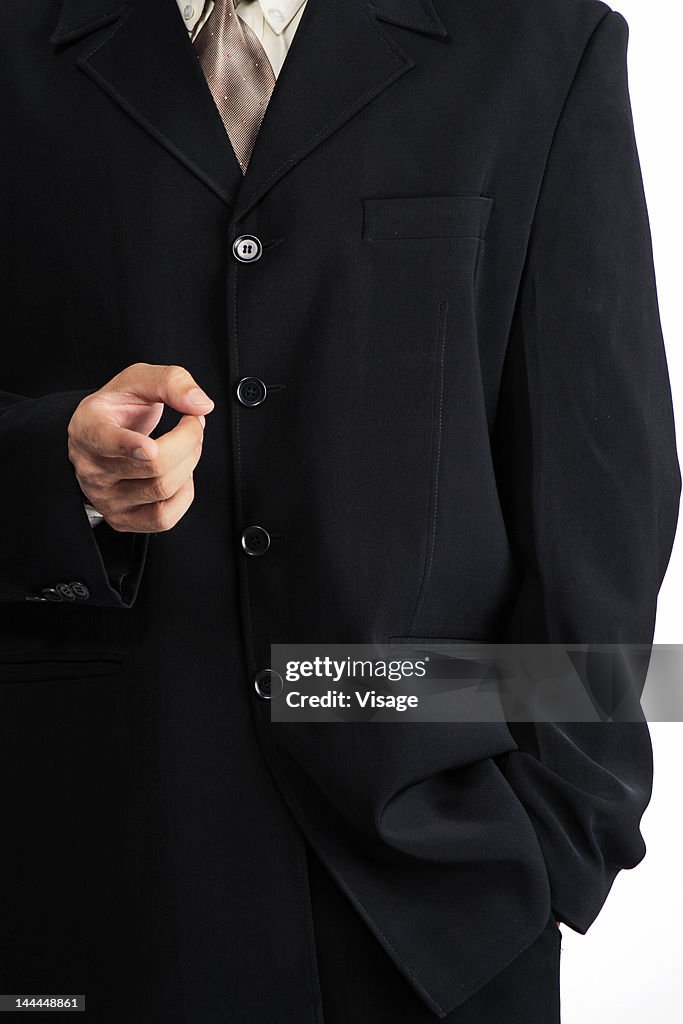 Close up of a man making a hand gesture